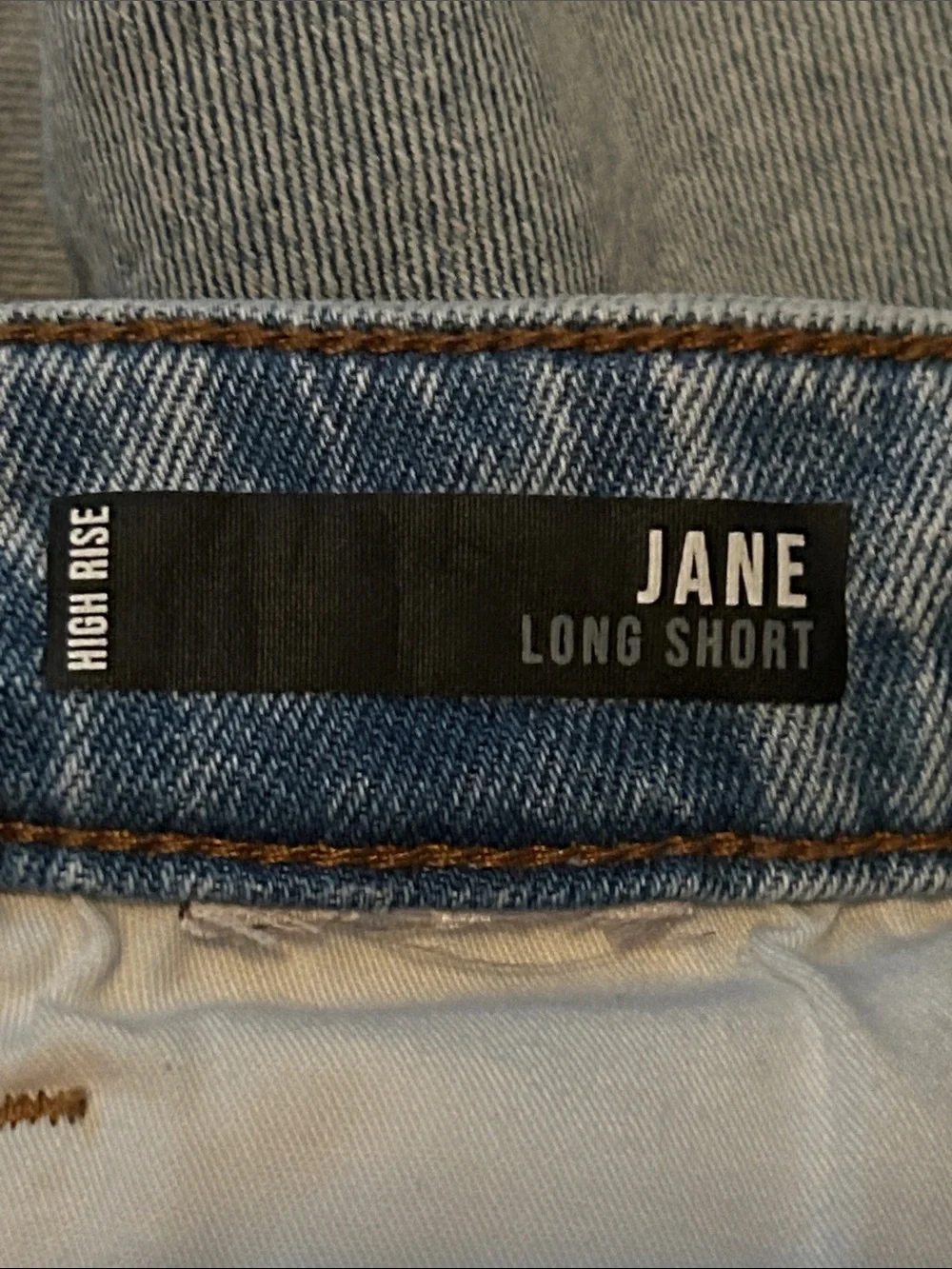 Kut from the Kloth High Rise Jane Long Shorts. Size 0. Light Blue Denim.